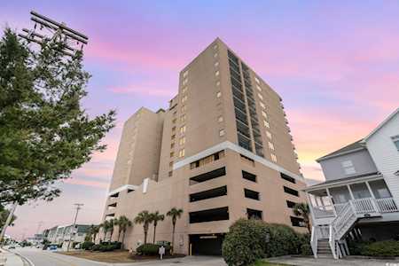 Beachwalk courtyard scene with condo complex surroundings