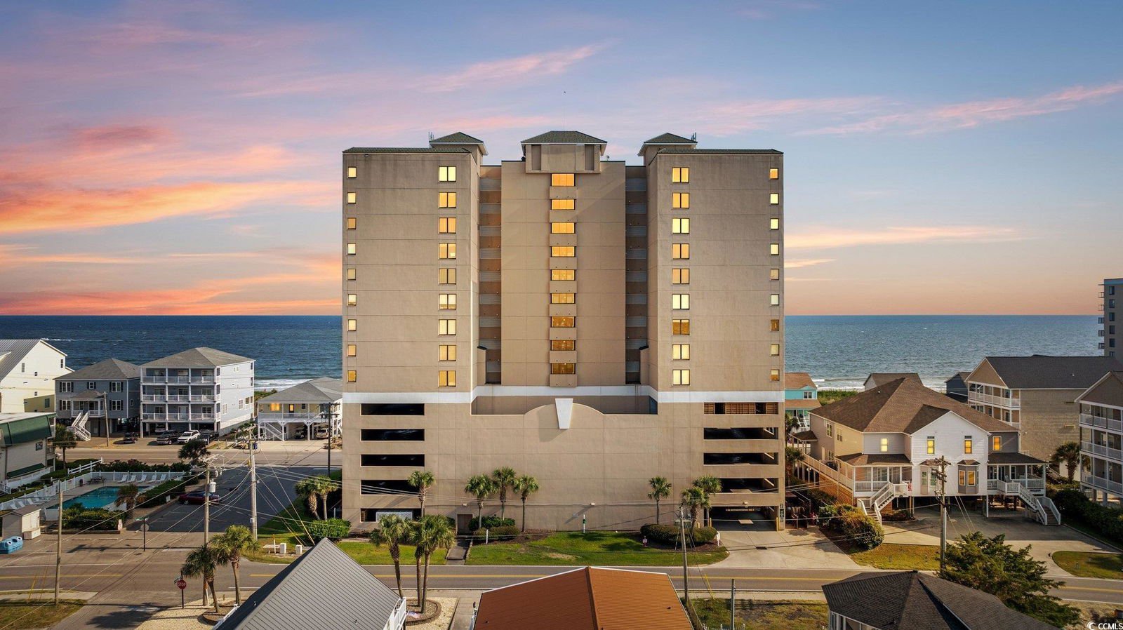 Condo exterior near beach access and parking area