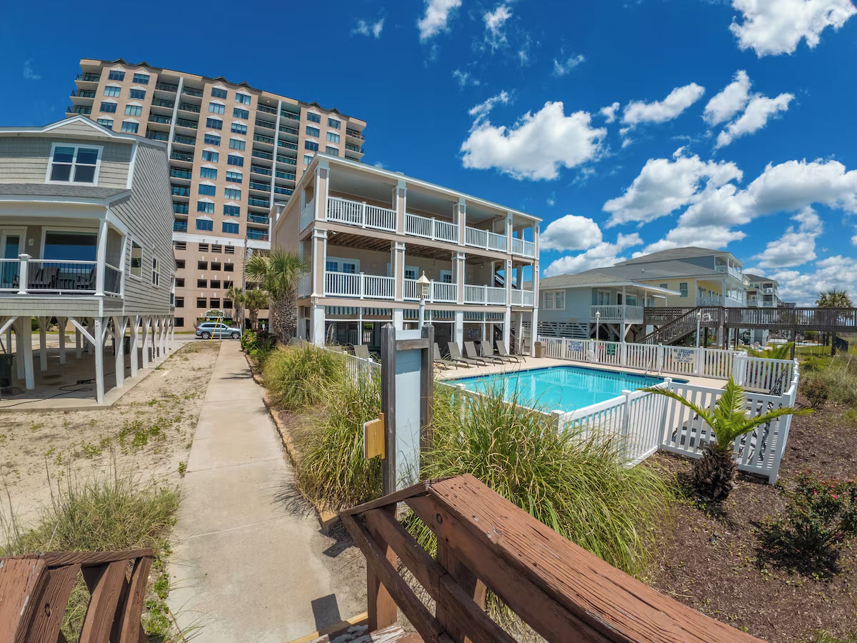 BeachWalk Villas oceanfront exterior and shoreline